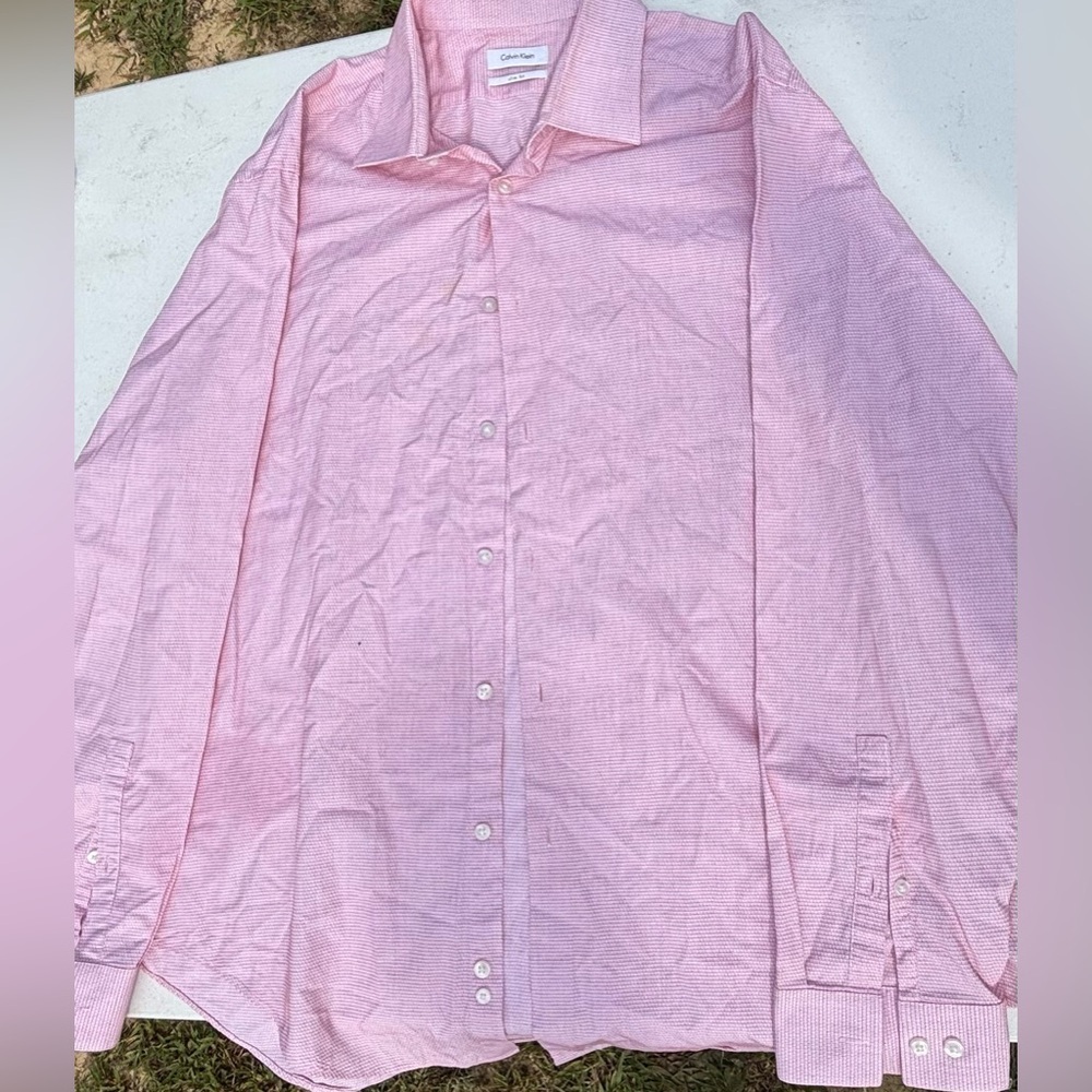 Calvin Klein light pink, long-sleeved dress shirt with a subtle pattern